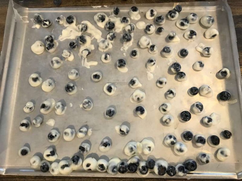 pan of homemade yogurt covered blueberries