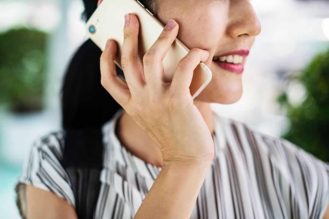 woman on a cell phone late pick up