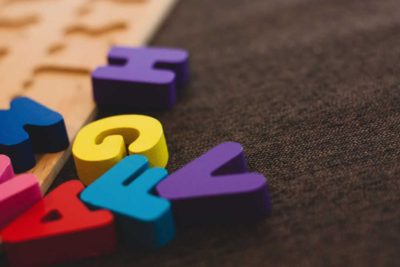 colorful wooden letters on the floor